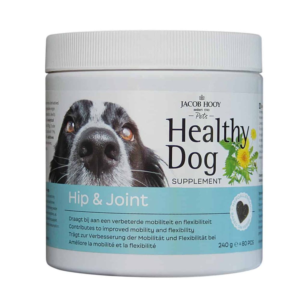 Potje Healthy Dog supplement voor honden met label en afbeelding van een hond.