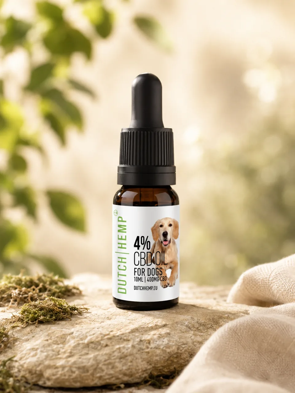 Dutch Hemp CBD oil for dogs on a mossy stone with linen